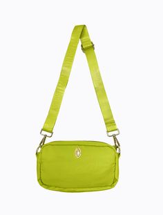 Compact, squishy and versatile. The Bobby bag is like the big brother to our best selling Nifty camera bag; ideal for travelling, festivals and everyday use. Deceptively roomy compared to its size the Bobby features double pockets on the front, as well as 3 more hidden pockets on the inside lining. Made from high quality chartreuse acid lime nylon with matching acid lime adjustable PL branded strap.Bag Measurements:Height: 12.5cmWidth: 24cmDepth: 6.5cm Nylon Shoulder Bag With Adjustable Strap For Trips, Green Nylon Bag With Detachable Strap, Nylon Shoulder Camera Bag With Removable Pouch, Nylon Camera Shoulder Bag With Removable Pouch, Nylon Shoulder Bag With Removable Pouch For Trips, Green Large Capacity Shoulder Bag For Trip, Green Shoulder Bag For Trip With Large Capacity, Green Shoulder Bag With Large Capacity For Trips, Functional Green Shoulder Bag For Trips