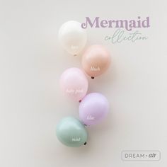 there are many balloons in the shape of mermaids on this white background with words underneath them