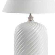 a white table lamp with a white shade on the base and a white lampshade