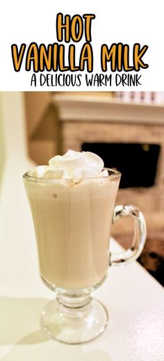 hot vanilla milk in a glass mug with whipped cream on top