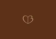 two hearts in the middle of a brown background