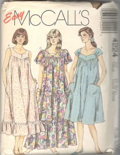 two women's nightgowns, one in blue and the other in pink