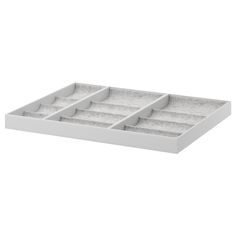 a white tray with four compartments on it