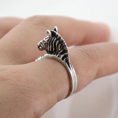 • Handcrafted Wrap Rings – Wear Felicity zebra wrap ring are carefully designed by jewelry artists to ensure they’re stylish and durable. They’re the perfect addition for animal lovers everywhere.• Classic, Intricate Detailing – Each small wrapped ring features the “zebra”, a zebra that is peering over your finger to remind you how much he loves you! • Wonderful Gift Choice – Animal wrap rings make a great birthday, anniversary, holiday, or “just because” gift for special women and girls in your Zebra Accessories, Animal Wrap Rings, Animal Themed Jewelry, Silver Wrap Ring, Just Because Gifts, Plate Design, Themed Jewelry, Wrap Rings, Zebras