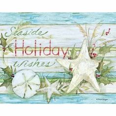 a sign that says seaside holiday wishes with starfish and holly on the beach side