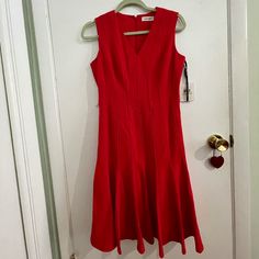 New Never Worn With Original Tags Red Calvin Klein Dress Size 4. It Comes Right Below The Knee. Calvin Klein Red Formal Dress, Calvin Klein Red Dresses, White Summer Dress Boho, Chic Red Calvin Klein Dress, Calvin Klein Summer V-neck Dress, Calvin Klein Fitted V-neck Sleeveless Dress, Button Front Maxi Dress, Wrap Shirt Dress, Halter Cocktail Dress