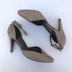 "Vintage Charles Jourdan Beige Taupe Tan ankle strap pumps sz 7 heel height: 3.75\" details: cut-out back of heel, gold accent details, gold hardware flaws: minor wear no marked size: 9.5\" heel to toe, approx sz 6.5 / 7 made in France Excellent Vintage Condition" Beige Heels With Buckle Closure For Evening, Gold Slingback Pumps With Wrapped Heel And Ankle Strap, Gold Ankle Strap Slingback Pumps With Wrapped Heel, Beige Ankle Strap Court Shoes For Evening, Beige Ankle Strap Court Shoes With 4-inch Heel, Beige Evening Court Shoes With Heel Strap, Vintage Ankle Strap Court Shoes For Formal Occasions, Gold Slingback Pumps With Ankle Strap, Gold Ankle Strap Slingback Pumps