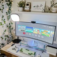 a computer monitor sitting on top of a desk