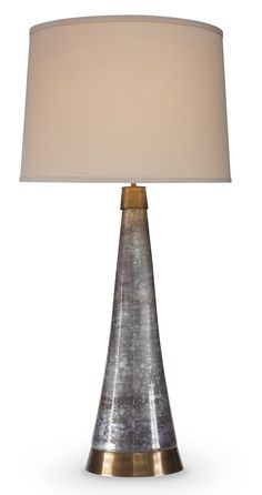 a table lamp with a white shade on it