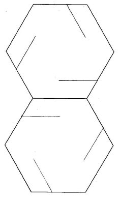 an origami box with two sides cut out to look like hexagonal shapes