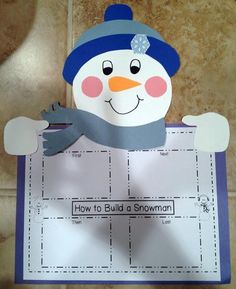 a paper snowman is on top of a piece of paper that says how to build a snowman