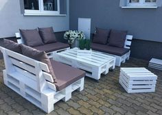 the outdoor furniture is made out of pallets