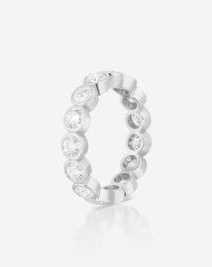 A modern update to the classic eternity band. Bezel Eternity Band, Necklace Length Guide, Bracelet Size Chart, Kids Rings, Kids Bracelets, Kids Earrings, Mens Band, Fine Jewelry Collection, Dream Ring