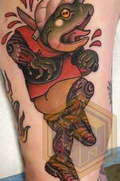 a man with a tattoo on his leg