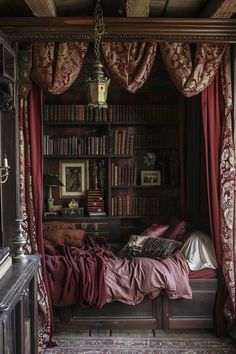 a bed sitting under a window next to a bookshelf filled with lots of books