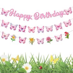 a happy birthday banner with butterflies and daisies in the grass on a white background