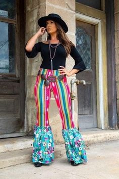 FUCHSIA AZTEC SERAPE AND JADE FLORAL CACTUS PANTS WITH FLARE RUFFLE HEM: These Pants are a super fun way to Express yourself with Bright vivid colors to make anyone stand out. These Aztec bells are a one of a kind statement piece. Women's Tops and Bottoms Size 2 TO 4 = Small  Size 6 TO 8 =Medium Size 10 To 12 = Large  Size 14 TO 16 XL Size 18 TO 20 = 2X  Size 22 To 24 = 3X Multicolor Flare Summer Pants, Multicolor Flare Pants For Summer, Bohemian Flare Bottoms For Fall, Bohemian Style Flare Bottoms For Fall, Spring Festival Flares, Multicolor Flare Hippie Bottoms, Hippie Style Multicolor Flare Bottoms, Stretch Festival Bottoms With Ruffles, Bohemian Spring Bottoms With Flared Hem