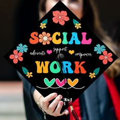 a woman wearing a black graduation cap that says social support work on the front and side