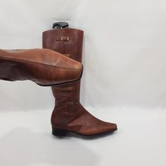 Introducing vintage brown square toe boots. These vintage women's knee-length buckle boots are comfortable and practical. Retro tailoring, will emphasize the beauty of your feet. They are made of genuine leather. Thanks to the elastic band they fit well around the shin. The fashion of the 90's - 00's offers you an iconic look that will stand the test of time. In good vintage condition. I can send additional photos upon request. Materials: leather The circumference calf width: 15 - 15,5 Inches He Fitted Brown Boots With Low Heel, Brown Fitted Mid-calf Boots, Fitted Brown Mid-calf Boots, Fitted Mid-calf Brown Boots, Vintage Low Heel Winter Boots, Wide Calf Vintage Mid-calf Boots, Fitted Brown Mid-calf Boots With Almond Toe, Vintage Heeled Boots With Square Toe For Winter, Vintage Square Toe Heeled Boots For Winter