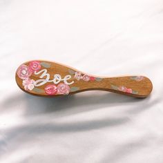 Introducing my charming hand-painted wooden baby hair brushes!! Each brush is painted with delicate flowers and personalized with my signature style of hand lettered name. Crafted from solid wood, the baby brush measures 6 inches tall by 1.5 inches wide, and the kids brush measures 9.5 inches tall by 3 inches wide. Whether as a cherished keepsake or a thoughtful gift, my hand-painted wooden baby hair brushes are the perfect choice for any baby girl's essentials! Shipping Processing time for cust Painted Hairbrush, Personalized Hair Brush, Custom Serving Tray, Baby Hair Brush, Wooden Brush, Custom Wooden Signs, Mirror Sign, Custom Mirrors