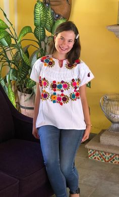 Mexican blouse, blouse with clips and fine embroidery, handmade blouse, blouse with multicolored floral embroidery, ethnic blouse, blouse of blanket. The embroidery of each blouse is unique so it may vary. This blouse is one size and fits S/M Mexican textile art has centuries of history and creativity throughout the country. Mexico is recognized as one of the leading countries with a beautiful aristic production in the textile world, miraculous hands of talented artisans from different states of Casual Multicolor Blouse With Intricate Embroidery, Casual Multicolor Embroidered Blouse, Traditional Short Sleeve Blouse For Cinco De Mayo, Folk Multicolor Embroidered Tops For Cinco De Mayo, Folk Style Multicolor Embroidered Top For Cinco De Mayo, White Embroidered Hippie Tops, Bohemian Blouse With Multicolor Embroidery For Fiesta, Fiesta Tops With Floral Embroidery, Embroidered Fiesta Blouse