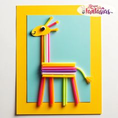 a giraffe made out of colored sticks on top of a blue and yellow background