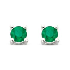 These classic stud earrings for her feature round-cut certified emeralds set in beautiful 14K white gold. The earrings secure with friction backs. Classic Emerald Diamond Earrings Gia Certified, Classic Gia Certified Emerald Diamond Earrings, Classic White Gold Emerald Diamond Earrings, Classic Gia Certified Green Diamond Earrings, Classic Green Gia Certified Diamond Earrings, Diamond Earrings With Prong Setting For May Birthstone, Classic Emerald Earrings With Prong Setting, May Birthstone Diamond Earrings With Prong Setting, Classic Round Diamond Earrings For May Birthstone