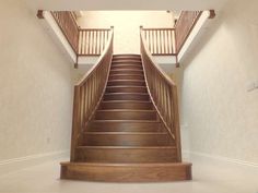 an empty staircase leading up to the second floor