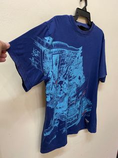 "Item :Vintage conart fusion t shirt Armpit to Armpit :22\" Length :29\" Large metarials 100%cotton conditions used vintage refer to pics carefully made in usa original / authentic ACCEPT PAYMENT: PAYPAL ONLY ALL ITEM WILL BE SHIPPED WITHIN 3-5 BUSINESS DAY AFTER RECEIVING CLEARED PAYMENT AND DELIVERED 3-5WEEKS WE ARE USING POST MALAYSIAN WITH YOUR TRACKING NUMBER. PLEASE LEAVE YOUR PHONE NUMBER DURING PURCHASE.PHONE NUMBER REQUIRES FOR MALAYSIAN POST (VERY IMPORTANT) THANKS FOR VIEWING 👍😊" Blue Relaxed Fit T-shirt With Graffiti Print, Blue Grunge Tops For Streetwear, Blue Urban Tops With Front Print, Urban Blue Tops With Front Print, Cotton Crew Neck Shirt With Graffiti Print, Blue Graffiti Print Crew Neck T-shirt, Blue Cotton Tops With Graffiti Print, Blue Crew Neck T-shirt With Graffiti Print, Short Sleeve Cotton Tops With Vintage Print