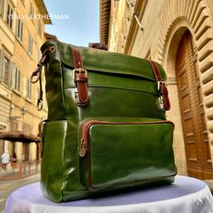 This Italian leather Backpack is a true masterpiece of craftsmanship. Handmade in Florence, Italy, it combines luxurious materials and exquisite attention to detail. Elevate your style and travel in sophistication with this elegant backpack. . Size: Height 45cm/17.8inch Width 36cm/14.2inch Depth 24cm/6-7 inch Color: Green . The story of this backpack: In the picturesque city of Florence, renowned for its rich history and exquisite craftsmanship, there existed a small leather workshop tucked away Elegant Backpack, Elegant Backpacks, Handmade Leather Backpack, Italian Leather Bags, Leather Workshop, Leather Backpacks, Leather Travel, Florence Italy, Handcrafted Leather