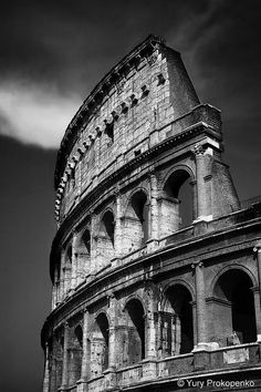 black and white photograph of the colossion in rome, italy by tony prokopeno