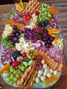 a platter filled with lots of different types of food