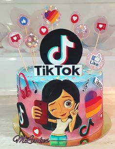 a birthday cake decorated with an image of tiktok