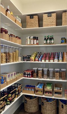 an organized pantry with baskets and food items