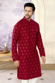 Reddish maroon full sleeves kurta crafted in silk with all over crescent bloom chikankari embroidery and sequin highlights. Paired with a pant. - Aza Fashions Red Traditional Wear With Cutdana And Long Sleeves, Red Long Sleeve Kurta For Traditional Ceremonies, Red Long Sleeve Traditional Wear For Puja, Red Sherwani With Chikankari Embroidery For Diwali, Long Sleeve Sherwani With Pallu For Puja, Red Long Sleeve Kurta With Cutdana, Red Chikankari Sherwani For Diwali, Red Sherwani With Chikankari Embroidery Long Sleeve, Long Sleeve Sherwani With Resham Embroidery For Puja