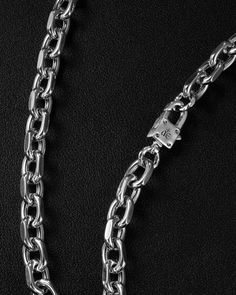 Cast and tethered by a forge, bearing links to charm all. Wear this sleek, versatile cable chain necklace on its own or imbue it with your essence by adorning it with your favourite charms from The Charm Lab series. Each link in the Catalyst Chain Necklace is meticulously carved with chiselled edges, embodying a versatile, genderless appeal.
Complete your look with other jewelry from the Catalyst series.
Sold individually. Each piece is lovingly crafted by hand, under ethical working conditions. Silver Link Necklace With Solid Construction, Silver Necklace With Solid Link Construction, Silver Cable Chain Necklace For Everyday Luxury, Luxury Silver Cable Chain Necklace For Everyday, Modern Jewelry With Rolo Chain And Oval Links, Silver Link Necklace For Everyday Luxury, Luxury Sterling Silver Chain Necklace With Lobster Clasp, Luxury Link Chain Necklace With Lobster Clasp, Luxury Cable Chain Necklace With Oval Link