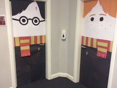 two doors with harry potter decorations on them