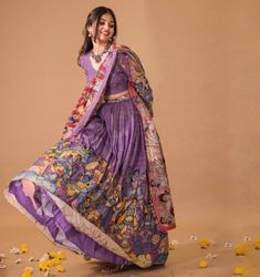 lehenga set  |womens kalamkari lehenga choli |crop top lehenga set |designer kalamkari lehenga dupatta | wedding lehenga choli | hand painted kalamkari lehenga usa Women's lehenga set /kalamkari embroidered lehenga skirt/voggish      lehengas are one of the beautiful and versatile traditional attires of india !! we carry such pieces in budget with great quality that can be styled in multiple ways with different outfits !!       Here is Beautiful lehenga set in lavender with pure silk hand painted authentic kalamkari set in which skirt has hand painted big border pattern  paired with matching full sleeve hand embroidered kalamkari blouse as shown!! This set comes with contrast all over kalamkari hand painted dupatta as shown , skirt has heavy gear and both pieces can be mix and matched with Luxury Semi-stitched Kalamkari Blouse Piece, Luxury Blouse Piece With Kalamkari Print For Puja, Kalamkari Lehangas Designs, Bohemian Lehenga With Sheer Dupatta For Wedding, Bohemian Wedding Lehenga With Sheer Dupatta, Unstitched Kalamkari Wedding Choli, Unstitched Wedding Choli With Kalamkari Print, Unstitched Bohemian Lehenga With Zari Work, Unstitched Bohemian Lehenga For Wedding