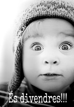 a little boy wearing a knitted hat with the words, it's divendres