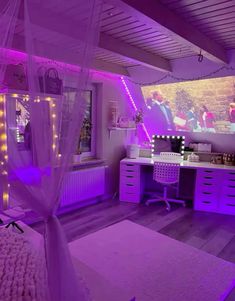 a bedroom with purple lighting and white furniture