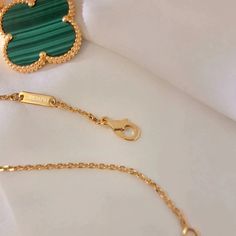 Indulge in the luxurious elegance of our Clover Malachite Gold Necklace. Crafted with a beautiful clover design and adorned with stunning malachite stones, this necklace exudes sophistication and style. Elevate any outfit and radiate confidence with this exclusive piece. ADDITIONAL INFORMATION Color: Gold Stone: Malachite Ref. 54233 Material:- 925 Sterling Silver - 18k Gold Plated- 18k Real Gold ( contact us via instagram) Our replica products are committed to quality and color when used. They a Elegant Gold Plated Emerald Pendant Necklace, Elegant Gold-plated Emerald Pendant Necklace, Elegant Gold-plated Emerald Clavicle Necklace, Luxury Green Malachite Necklace, Luxury Malachite Necklaces For Gifts, Luxury Green 14k Gold Necklaces, Green Luxury Jewelry With Adjustable Chain, Luxury Green Jewelry With Adjustable Chain, Luxury Gold Emerald Necklace As A Gift