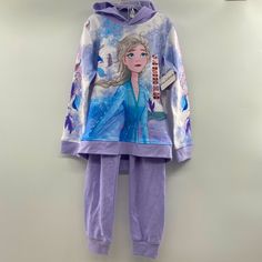 Disney Frozen Ii 2-Piece Sweatsuit Size Medium (7/8) Set Includes (1) Hoodie Sweatshirt With Elsa Graphic All Over And (2) Coordinating Sweatpants With Embroidered Elsa Patch Pants Have Elastic And Functional Drawstring Light Lining, Not Heavy Fleece Brand New With Tags Winter Character Print Long Sleeve Sets, Purple Long Sleeve Sets For Winter, Sweatshirt And Skirt Outfit, Disney Minnie Mouse Outfit, Tutu Couture, Watermelon Outfit, Frozen Outfits, Disney Hoodie, Minnie Mouse Hoodie