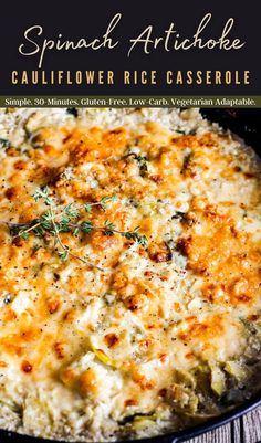 spinach artichoke cauliflower rice casserole in a cast iron skillet