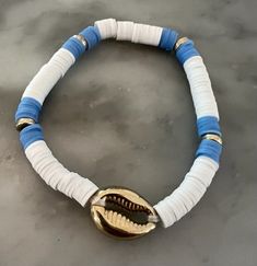 Blue and white clay bead bracelet with gold accents - adult size White And Gold Clay Bead Bracelet, Blue Clay Bead Bracelets, White Clay Bead Bracelet, White Beads Bracelet, Clay Bead Bracelet, Bracelet Inspo, Blue Clay, Clay Bracelet, Diy Bracelet Designs