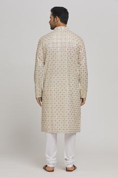 Ivory and golden cotton kurta with sequins and thread embroidery. Comes with churidar. - Aza Fashions Gold Embroidered Chanderi Sherwani, Off White Kurta With Gota Work For Eid, Unstitched Traditional Wear With Gold Embroidery For Eid, Gold Straight Kurta For Reception, Festive Gold Kurta With Mirror Work, Festive Off White Kurta With Gota Work, Festive Straight Kurta With Gold Embroidery, Unstitched Off White Kurta For Festive Occasions, Gold Embroidered Straight Kurta