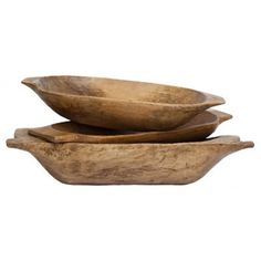 three wooden bowls sitting on top of each other