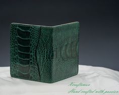 This my unique handmade cardholder is made from high-quality genuine ostrich leather. The texture is unique, the color is deep and fascinating. I've tried my best to put my unique technique and my passion into this small piece. Every single wallet is made to order, there won't be a second same thing. If you are looking for a small accessory but it can express yourself, this wallet is made for you! Dimension: 3.1 inches x 3.9 inches (8 cm x 10 cm) when folded It's small and comfortable to put int Green Luxury Card Holder With Interior Slots, Green Leather Luxury Card Holder, Luxury Green Leather Card Holder, Leather Wallet Mens Handmade, Minimalist Card Wallet, Handcrafted Leather Wallet, Minimalist Cards, Slim Leather Wallet, Front Pocket Wallet