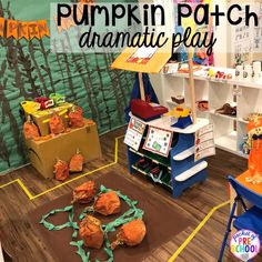 a classroom with pumpkins on the floor and bookshelves in the back ground