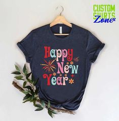 New Years Eve Shirt,Hello 2025 Happy New Years T-Shirt,Happy New Year Party Clothing For Women, Kids Toddler Christmas Shirts,New Year Gift 🎁 Enjoy your shopping ! Need custom made shirts? Don't hesitate to message us! Thanks for your support! CustomShirtsZone_ Family ✨There are all sizes in the dropdown menu. These designs are for both kids and adults. Please make sure you purchased the correct size. ----- How To Order ----- 1-) Please, check and review all the photos. 2-) Choose your t-shirt size and color. *Different styles of shirts may have different shades of same color choice due to different manufacturer brands. *For this reason, we recommend you to match shirts from the same styles if you want precisely matching colors (ex. Unisex, V-necks, Toddler, etc.). 3-) Click add to cart. Toddler Christmas Shirts, Hello 2025, Happy New Year Party, Toddler Christmas Shirt, New Years Eve Shirt, Happy New Years, Custom Made Shirts, New Year Party, Toddler Christmas