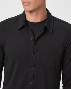 This versatile button down shirt is cut from extra soft tech jersey that is made up of the highest quality performance yarns for the most comfortable fit. Stockton features a classic collar with collar stays, a single chest pocket and tonal buttons. You'll love the way this black button down looks with your favorite jeans for a casual look or with trousers for a more dressed up look. Collared Solid Shirt For Layering, Collared Shirt For Layering, Solid Collared Shirt For Layering, Casual Button-up Shirt With Seamless Collar, Casual Black Button-up Dress Shirt, Black Cotton Button-up Shirt, Black Solid Color Button-up Shirt, Unstructured Black Button-up Shirt, Washed Black Button-up Shirt With Pockets